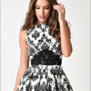 Fit and flare black and white swing dress